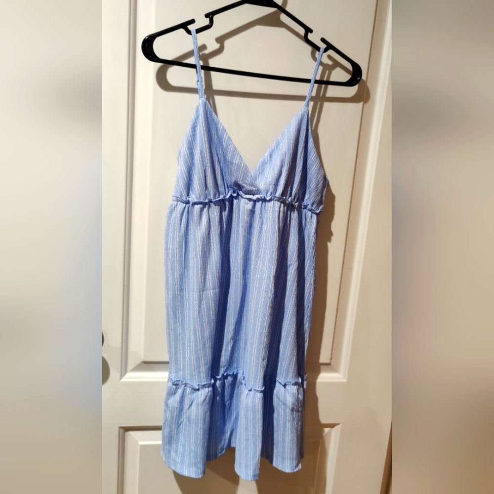 Short blue dress with ruffles